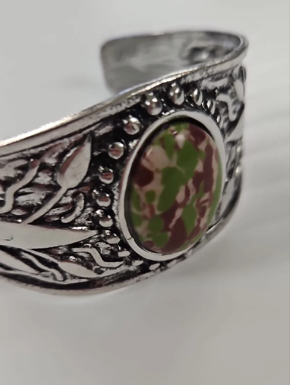 Silver-Tone Floral Cuff Bracelet with Green and Burgundy Stone